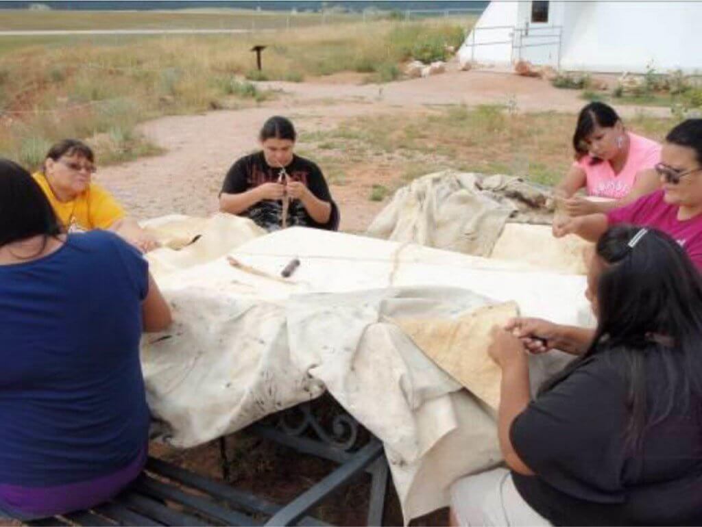 The Cheyenne group returned in August to sew the hides together in a half circle, which took three days. The sewing involved poking holes with an awl, and the hides were sewn together at their edges using sinew as thread. 